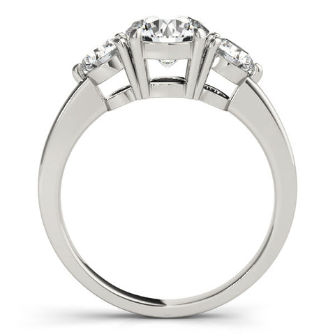 White gold Three-Stone Round Cut Solitaire Ring with Prong Setting on a Classic Band