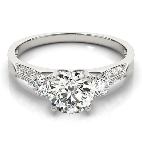 White gold Round Brilliant Three-Stone Diamond Ring with Pavé Band and Four-Prong Setting