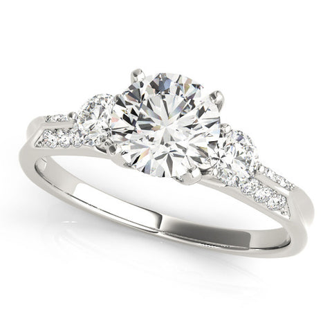 White gold Round Brilliant Three-Stone Diamond Ring with Pavé Band and Four-Prong Setting