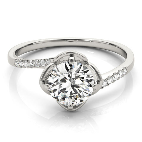 White gold Round Brilliant Solitaire with Pavé Band and Four-Prong Cushion Setting