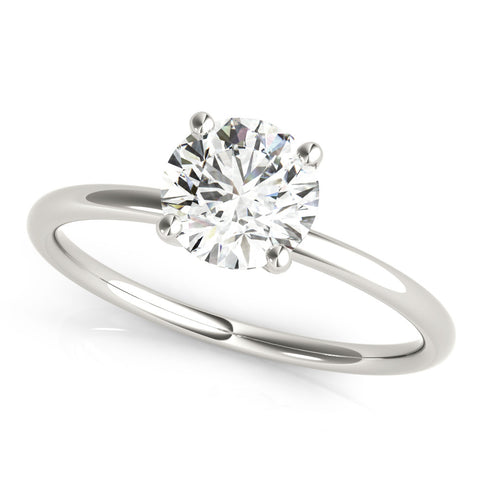 White gold Round Solitaire Diamond Ring with 4-Prong Setting on a Classic Band