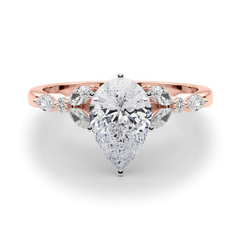 Rose gold Pear Diamond Solitaire with Side Stones on a White Gold Band and Four-Prong Setting