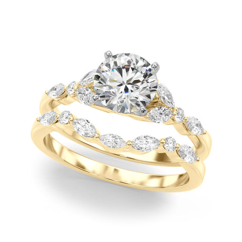 Yellow gold Round Diamond Solitaire with Side Stones on a White Gold Band and Four-Prong Setting