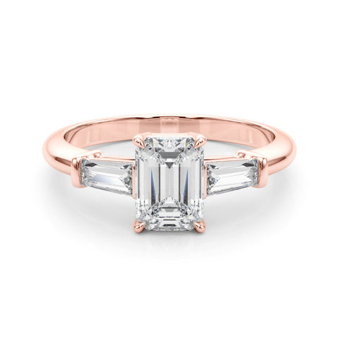 Rose gold Emerald Cut Diamond Ring with Tapered Baguette Side Stones on a Platinum Band with Four-Prong Setting