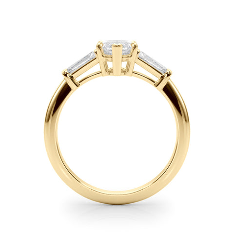 Yellow gold Marquise Diamond Solitaire Ring with Tapered Baguette Side Stones and Six-Prong Setting