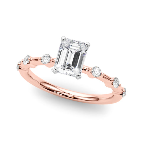 Rose gold Emerald Solitaire Diamond Ring with Bezel Set Side Stones and Prong Setting