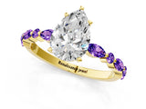 Dynamic Name Yellow gold Pear Cut Diamond Ring with Marquise and Round with Tanzanite side stone Side Stones and Four-Prong Setting_1