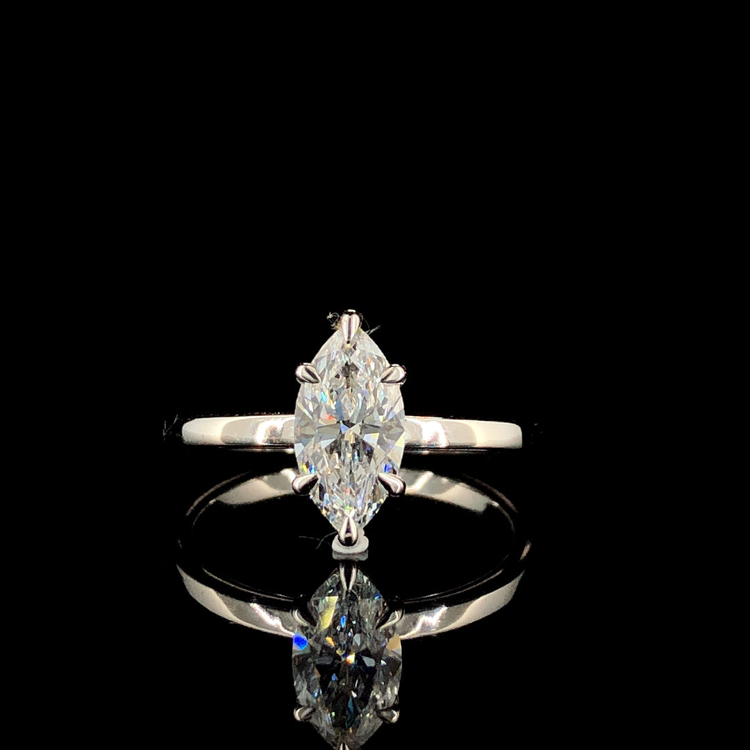 Marquise Solitaire Engagement Ring with Six-Prong Setting on a Silver Band 1