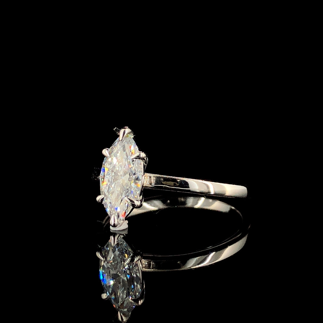 Marquise Solitaire Engagement Ring with Six-Prong Setting on a Silver Band