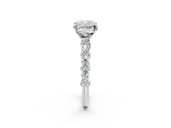 1 Carat Cushion Cut Platinum Diamond Side Stone Solitaire Ring with Round and Four-Prong Setting