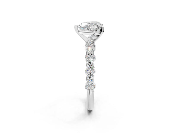 1 Carat Heart Cut Platinum Diamond Side Stone Solitaire Ring with Round and Four-Prong Setting