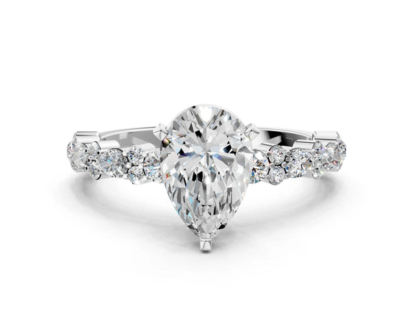1 Carat Pear Cut Platinum Diamond Side Stone Solitaire Ring with Round and Four-Prong Setting