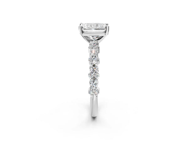1 Carat Radiant Cut Platinum Diamond Side Stone Solitaire Ring with Round and Four-Prong Setting