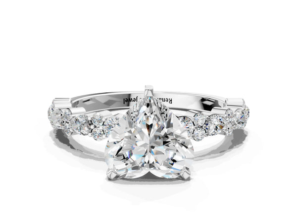 3 Carat Heart Cut Platinum Diamond Side Stone Solitaire Ring with Round and Four-Prong Setting