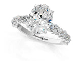 Platinum 4 Carat Oval Cut  Solitaire with Side Stones, Pave Band, Four-Prong Setting_25