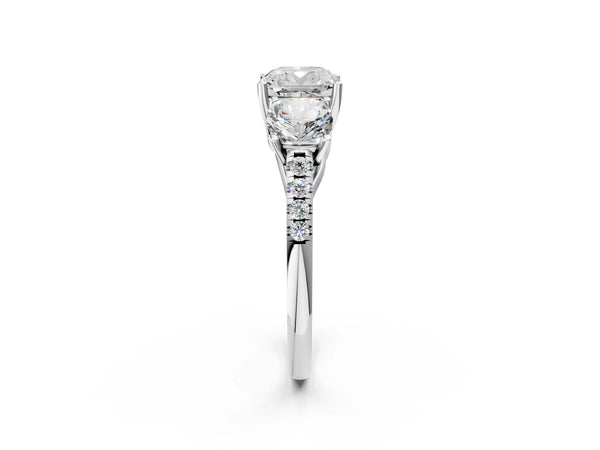 Platinum 5 Carat Three-Stone Cushion Cut Diamond Ring with Round  Pavé Band and Prong Setting