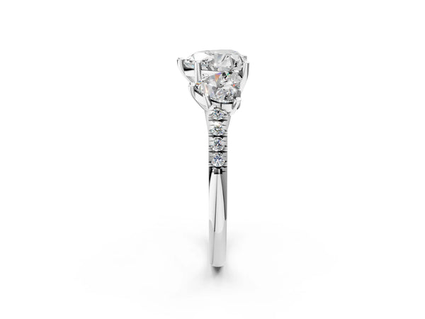 Platinum 5 Carat Three-Stone Heart Cut Diamond Ring with Round  Pavé Band and Prong Setting