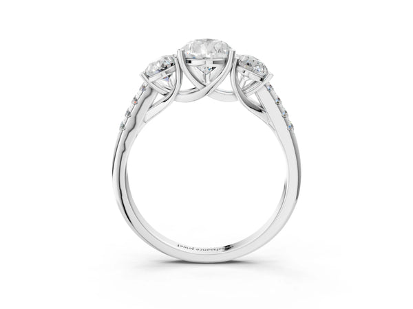 Platinum 5 Carat Three-Stone Pear Cut Diamond Ring with Round  Pavé Band and Prong Setting