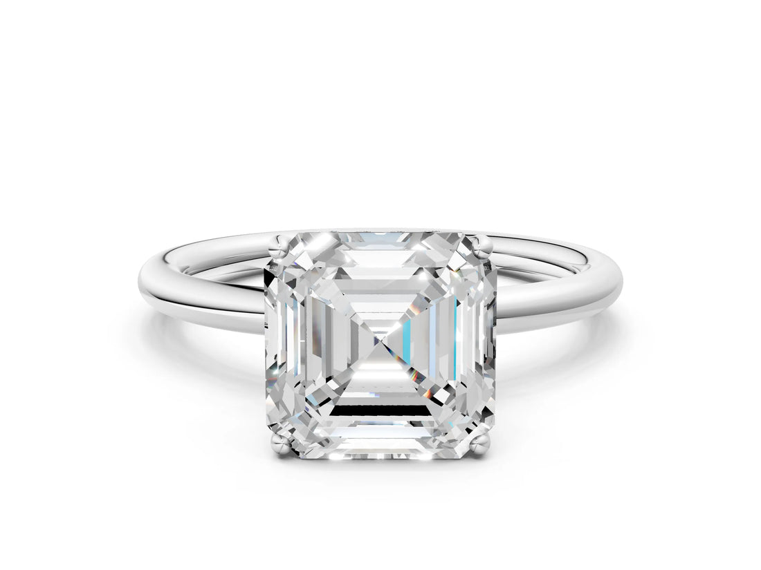 Platinum Asscher Solitaire Diamond Ring with a Classic Band and Four-Prong Setting