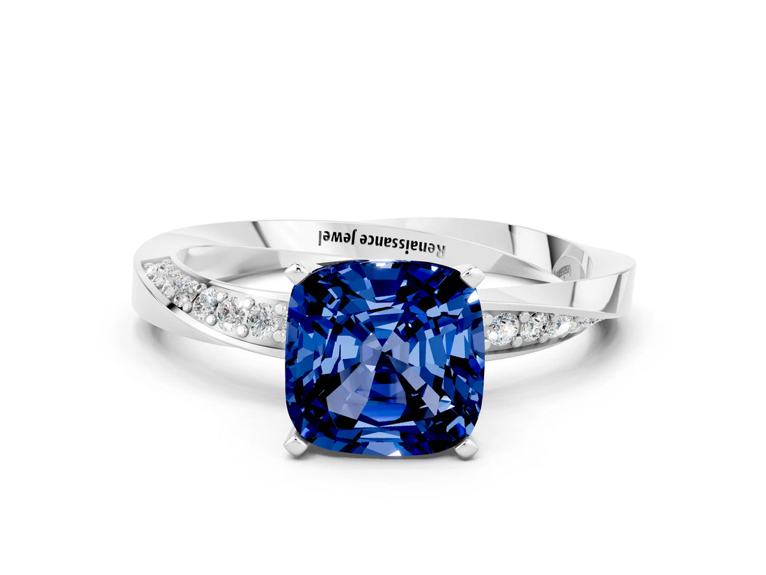Platinum Cushion Cut Blue Sapphire Engagement Ring with Side Stone Accents and Four-Prong Setting_12