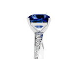 Platinum Cushion Cut Blue Sapphire Engagement Ring with Side Stone Accents and Four-Prong Setting_17