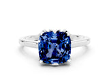 Platinum Cushion Cut Blue Sapphire Solitaire Ring with Flower Prong Setting and Classic Band