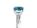 Platinum Cushion Cut Blue Topaz Engagement Ring with Side Stone Accents and Four-Prong Setting_17