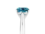 Platinum Cushion Cut Blue Topaz Solitaire Engagement Ring with Cathedral Setting and Four-Prong Mount_17