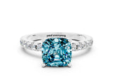 Platinum Cushion Cut Blue Topaz Solitaire Ring with Round  Pavé Band and Four-Prong Setting_24