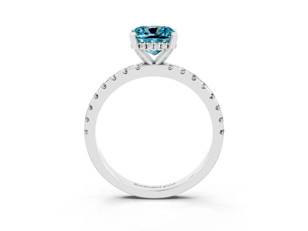 Platinum Cushion Cut Blue Topaz Solitaire Ring with Round Pavé Band and Four-Prong Setting