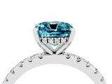 Platinum Cushion Cut Blue Topaz Solitaire Ring with Round  Pavé Band and Four-Prong Setting_28