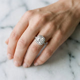 Platinum Cushion Cut Diamond Floral Halo Engagement Ring with Pavé Band and Prong Setting_59