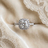 Platinum Cushion Cut Diamond Floral Halo Engagement Ring with Pavé Band and Prong Setting_62
