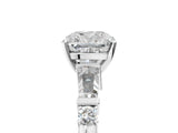Platinum Cushion Cut Diamond Ring with Baguette Side Stones, Channel Set Band, and Four-Prong Setting_38