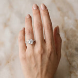 Platinum Cushion Cut Diamond Ring with Marquise and Round  Side Stones and Four-Prong Setting