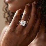 Platinum Cushion Cut Diamond Ring with Marquise and Round  Side Stones and Four-Prong Setting