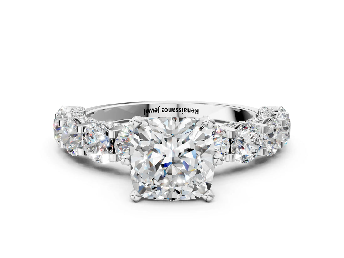 Platinum Cushion Cut Diamond Side Stone Engagement Ring with Four-Prong Setting