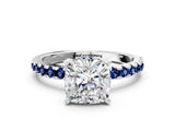 Platinum Cushion Cut Diamond Solitaire Ring with Round with Blue Sapphire side stone Pavé Band and Four-Prong Setting_12