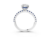 Platinum Cushion Cut Diamond Solitaire Ring with Round with Blue Sapphire side stone Pavé Band and Four-Prong Setting_15