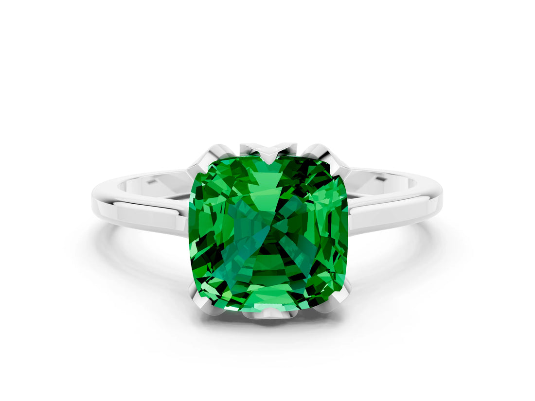 Platinum Cushion Cut Emerald Solitaire Ring with Flower Prong Setting and Classic Band