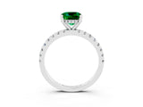 Platinum Cushion Cut Emerald Solitaire Ring with Round  Pavé Band and Four-Prong Setting_39