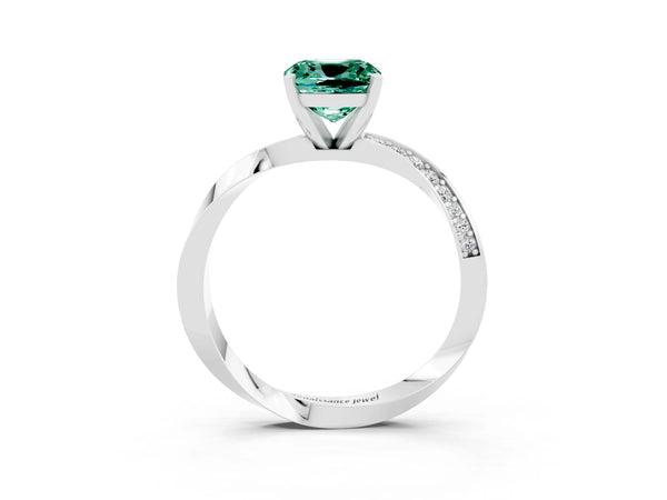 Platinum Cushion Cut Green Sapphire Engagement Ring with Side Stone Accents and Four-Prong Setting