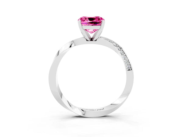 Platinum Cushion Cut Pink Sapphire Engagement Ring with Side Stone Accents and Four-Prong Setting