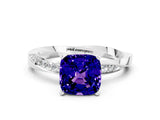 Platinum Cushion Cut Tanzanite Engagement Ring with Side Stone Accents and Four-Prong Setting_12