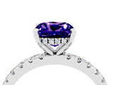 Platinum Cushion Cut Tanzanite Solitaire Ring with Round  Pavé Band and Four-Prong Setting_40