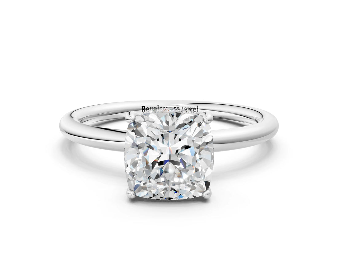 Platinum Cushion Solitaire Diamond Ring with a Classic Band and Four-Prong Setting