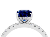 Platinum Emerald Cut Blue Sapphire Solitaire Ring with Round  Pavé Band and Four-Prong Setting_40