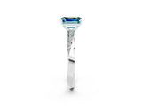 Platinum Emerald Cut Blue Topaz Engagement Ring with Side Stone Accents and Four-Prong Setting_14