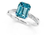Platinum Emerald Cut Blue Topaz Engagement Ring with Side Stone Accents and Four-Prong Setting_37