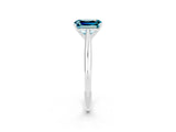 Platinum Emerald Cut Blue Topaz Solitaire Engagement Ring with Cathedral Setting and Four-Prong Mount_2